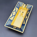 Blue and gold Art Deco metal cigar ashtray with raised cigar rest