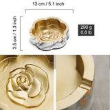 Flower shaped ceramic ashtray dimensions with raised rose design and cigarette grooves
