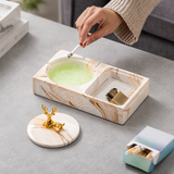 Ceramic ashtray with lid used for cigarette and lighter storage on tabletop