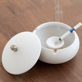 Matte Ivory ceramic ashtray with lid, open view and middle pedestal