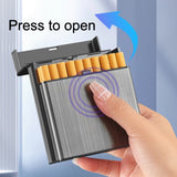 Hand pressing top of cigarette case to open