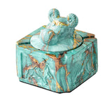 Turquoise gold covered ceramic ashtray with sculpted ram head knob and raised relief details