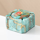 Turquoise gold covered ceramic ashtray with red enamel decorative lid knob