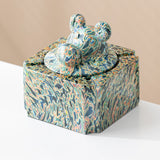 Ocean swirl covered ceramic ashtray with ram head lid knob and bold marble pattern