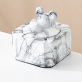 Gray smoke covered ceramic ashtray with sculpted ram head knob and marble-style pattern