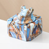 Blue gold covered ceramic ashtray with ram head lid knob and glossy marble-style finish