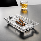 Crystal glass cigar ashtray with cigar and whiskey glass for premium smoking setup