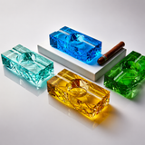 Four-color crystal glass cigar ashtray collection in Amber Gold, Sapphire Blue, Emerald Green and Aqua Clear