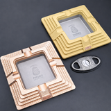 Egyptian pyramid metal cigar ashtray in antique gold and matte gold variants with cigar cutter
