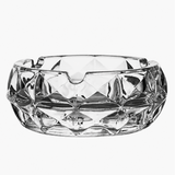 Clear faceted glass ashtray with diamond cut design