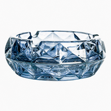 Blue faceted glass ashtray for cigarettes