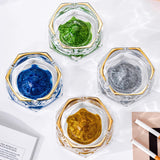 Set of blue, green, gold, and silver iceberg glass ashtrays with glitter base and gold rim