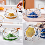 Luxury glass ashtray lifestyle display with multiple colors, gold rim, and faceted iceberg texture