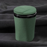 Green LED car ashtray with lid on black fabric