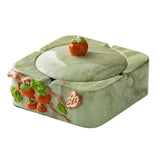 Sage green marble-look ceramic ashtray with lid and decorative persimmon accent