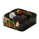 Black gold marble-look lidded ceramic ashtray with persimmon accent and covered square design