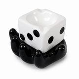 White dice ceramic ashtray with black hand holder on white background