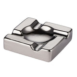 Silver electroplated ceramic cigar ashtray isolated on white background