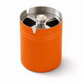 Tall orange covered stainless steel ashtray with rotating lid and cigarette slots