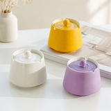 Modern covered ceramic ashtrays in mustard yellow ivory white and lavender purple