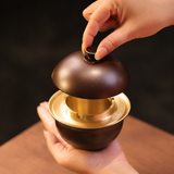 Dark Bronze brass covered ashtray with removable lid being lifted
