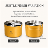 Stainless steel ashtray surface finish variation comparison showing smooth body and version with subtle decorative lines