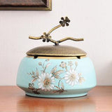 Powder blue ceramic ashtray with lid and white daisy floral design