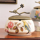Ivory ceramic ashtray with lid and rose bird design