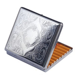 Vintage engraved metal cigarette case open with cigarettes inside, fits 20 standard cigarettes