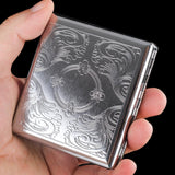 Classic Scroll engraved metal cigarette case held in hand for size reference