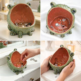 Frog-shaped jewelry holder with jewelry inside, shown from multiple angles.