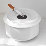 Small white ceramic ashtray isolated on white background