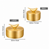 Two gold-toned brass ashtray with bird-shaped lids are shown on a white background, labeled LARGE and SMALL with height and diameter measurements.