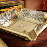 Antique green vintage square cigar ashtray with 4 cigar rests and decorative engraved design for tabletop smoking setup