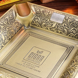 Large antique green square cigar ashtray holding a cigar with sturdy zinc alloy body and elegant vintage detailing