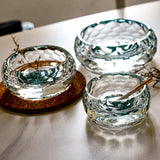 Round crystal glass ashtrays shown in different sizes