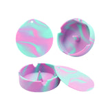 Marbled pink and teal silicone ashtray with lid shown open and closed