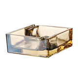 Amber square glass ashtray isolated on white background