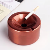 Rose stainless steel ashtray with funnel lid and cigarette