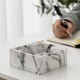 Square ceramic marble pattern ashtray displayed on table for everyday smoking use