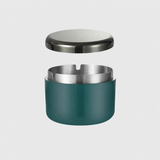 Teal green covered ashtray with glossy black lid and stainless steel insert for patio and balcony use