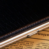 Close-up of cigarette case side profile and slim thickness