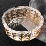 Amber crystal glass ashtray with geometric cut pattern, luxury decorative cigarette ashtray