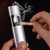Silver portable metal pocket ashtray being opened for ash and cigarette butts