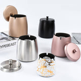 Stainless steel covered ashtrays displayed in multiple colors with removable lids