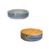 Blue ceramic ashtray with matching lid and rounded cigarette rests