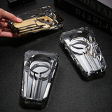 Three crystal glass cigar ashtrays on dark tabletop and cigar accessory