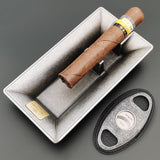 Silver rectangular metal cigar ashtray with cigar and cutter set