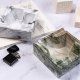 Gray smoke marble pattern ashtray with polished finish and practical cigarette rests