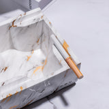 Gray smoke square ceramic ashtray with cigarette placed in the edge groove